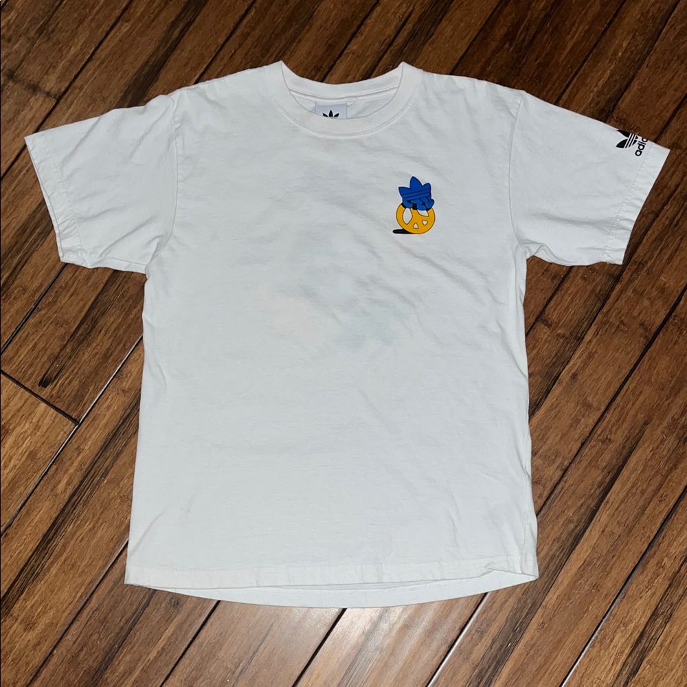 Adidas "Funky Maniac Tee" in white cotton featuring a blue and yellow graphic